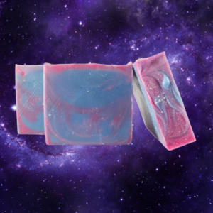 A trio of blue, red, and purple swirled soaps floating in an outer space background.