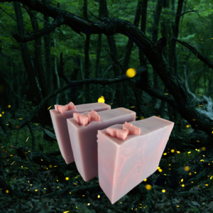 A light-purple soap with cantaloupe swirls in a mysterious forest.