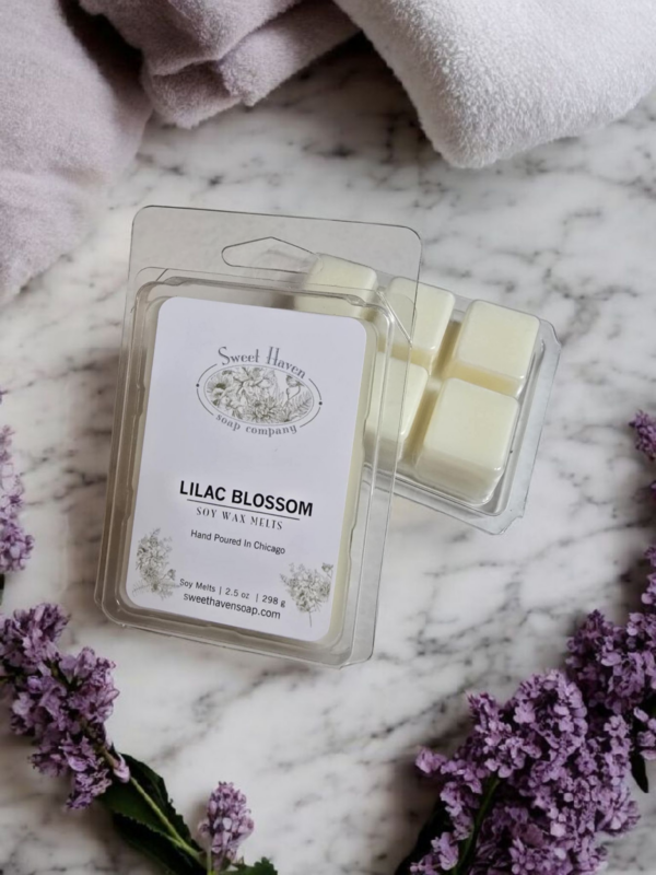 a pack of six all-natural, pure soy wax melt cubes, richly scented with lilac blossom fragrance.